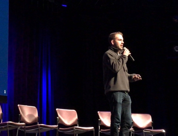 OpenSea's Devin Finzer speaking at NFT.NYC in 2019.